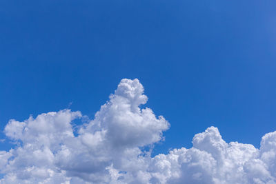 Low angle view of clouds in blue sky