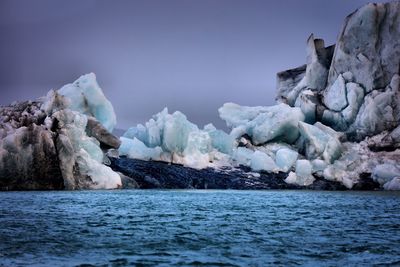 Scenic view of frozen sea against sky