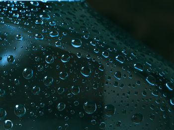 Close-up of water drops on glass