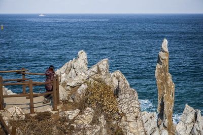 Scenic view of sea against blue sky