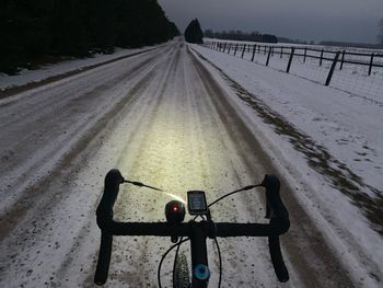 High angle view of bicycle on road during winter