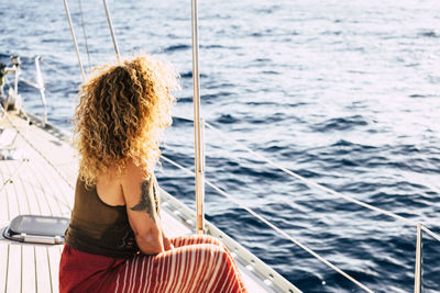 Rear view of woman in sea