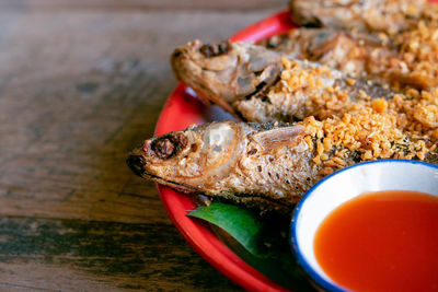 High angle view of fish in plate on table