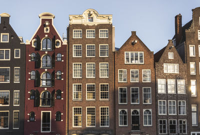 Low angle view of residential building against sky.