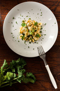 High angle view of vegetables in plate on table
