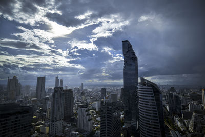 Modern buildings in city against sky