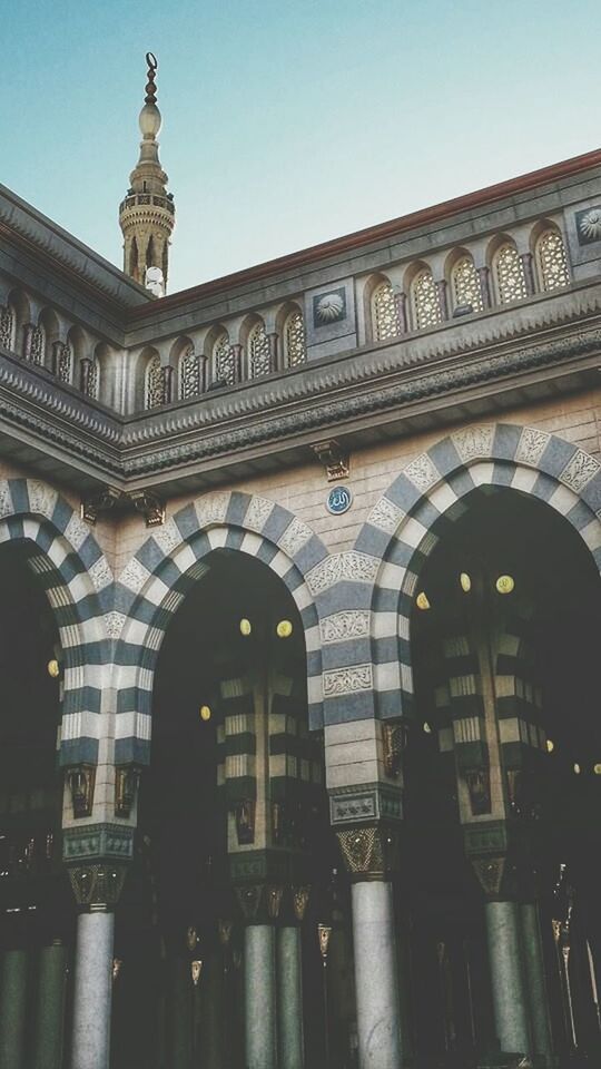 architecture, built structure, building exterior, low angle view, clear sky, arch, facade, famous place, city, travel destinations, history, building, outdoors, window, capital cities, architectural column, day, tourism, no people, sky