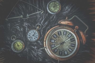 High angle view of clock on table