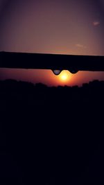 Scenic view of silhouette landscape against clear sky during sunset