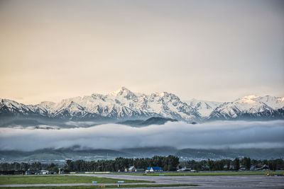 Scenic view of snow covered mountains