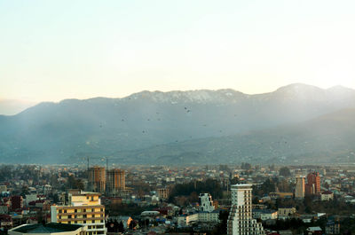 Cityscape against clear sky