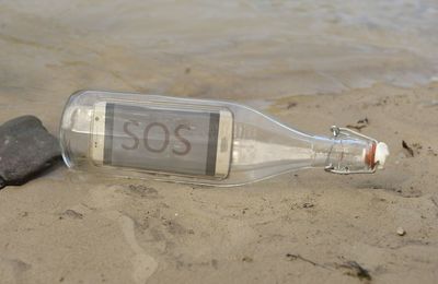 Close-up of water on sand at beach