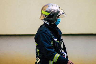 Side view of man wearing mask