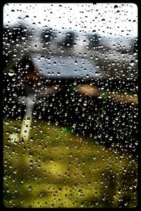 Close-up of water drops on glass