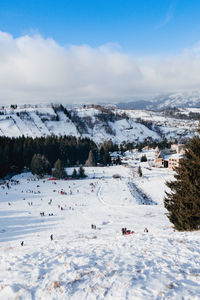 Scenic view of snowcapped mountains against sky