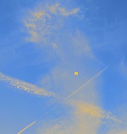 Low angle view of vapor trail in sky