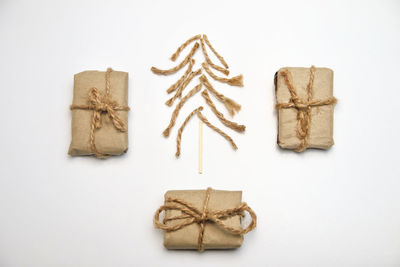 High angle view of christmas decorations on white background