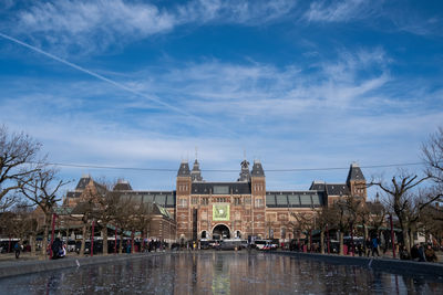 Group of people in front of buildings