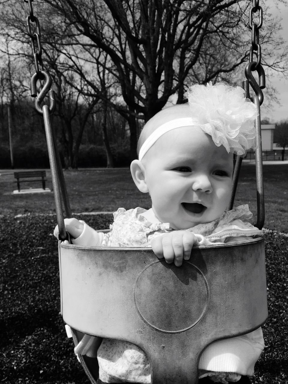 childhood, tree, park - man made space, elementary age, girls, person, cute, innocence, day, flower, bench, front or back yard, casual clothing, outdoors, park, playground, sitting, leisure activity