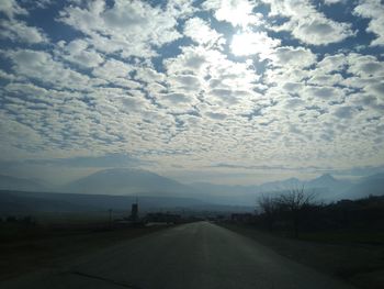 Road against sky during sunset