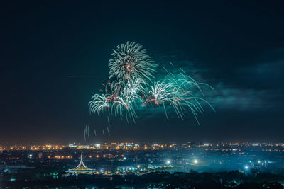 Firework display at night