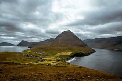 Scenic view of landscape and mountains against sky