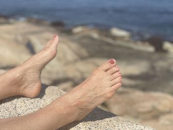 Low section of person on beach