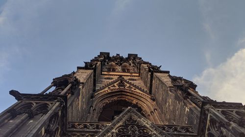 Low angle view of old building against sky