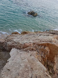 High angle view of rocks on beach