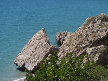 Close-up of rocks by sea