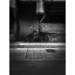 Bicycle on table by window