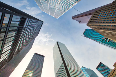 Low angle view of modern buildings against sky