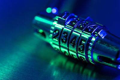 Close-up of shiny lock on table