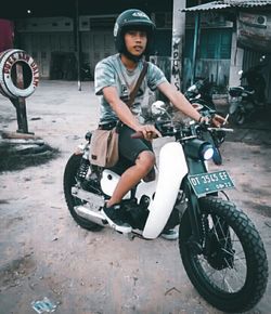 Portrait of man riding motorcycle