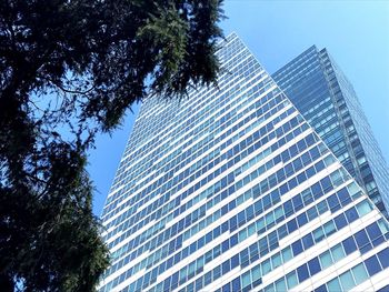 Low angle view of modern building against sky