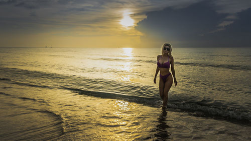 Beautiful women walking at beach