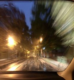 Blurred motion of car on street in city