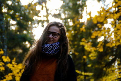 Close-up of young woman standing outdoors