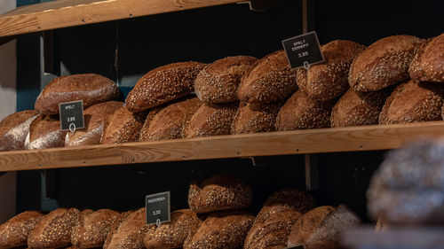 Close-up of croissants and bakery for sale at store