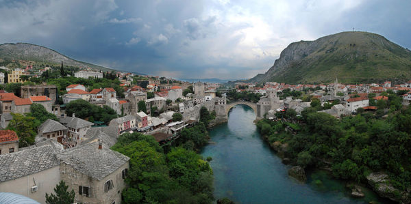 Panoramic view of town against sky