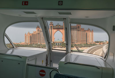 Buildings seen through car window