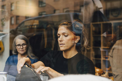 Portrait of a mid adult woman looking at camera