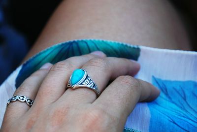 Close-up of hands with tattoo