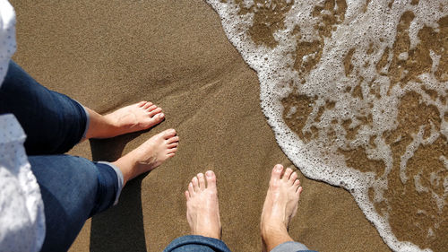 Low section of people on beach