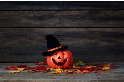 Pumpkin on wooden table during autumn