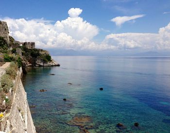 Scenic view of sea and bay against sky