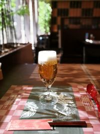 Close-up of beer on table