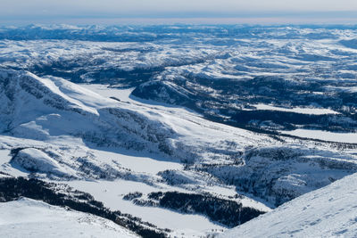 Aerial view of snow covered landscape