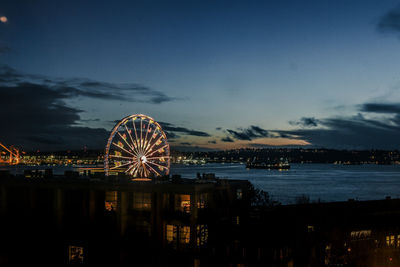 Scenic view of sea against sky at night