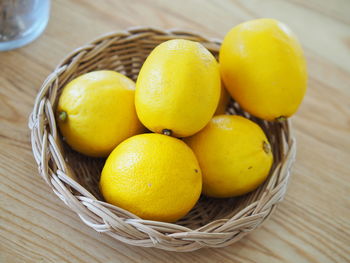 High angle view of fruits in basket on table